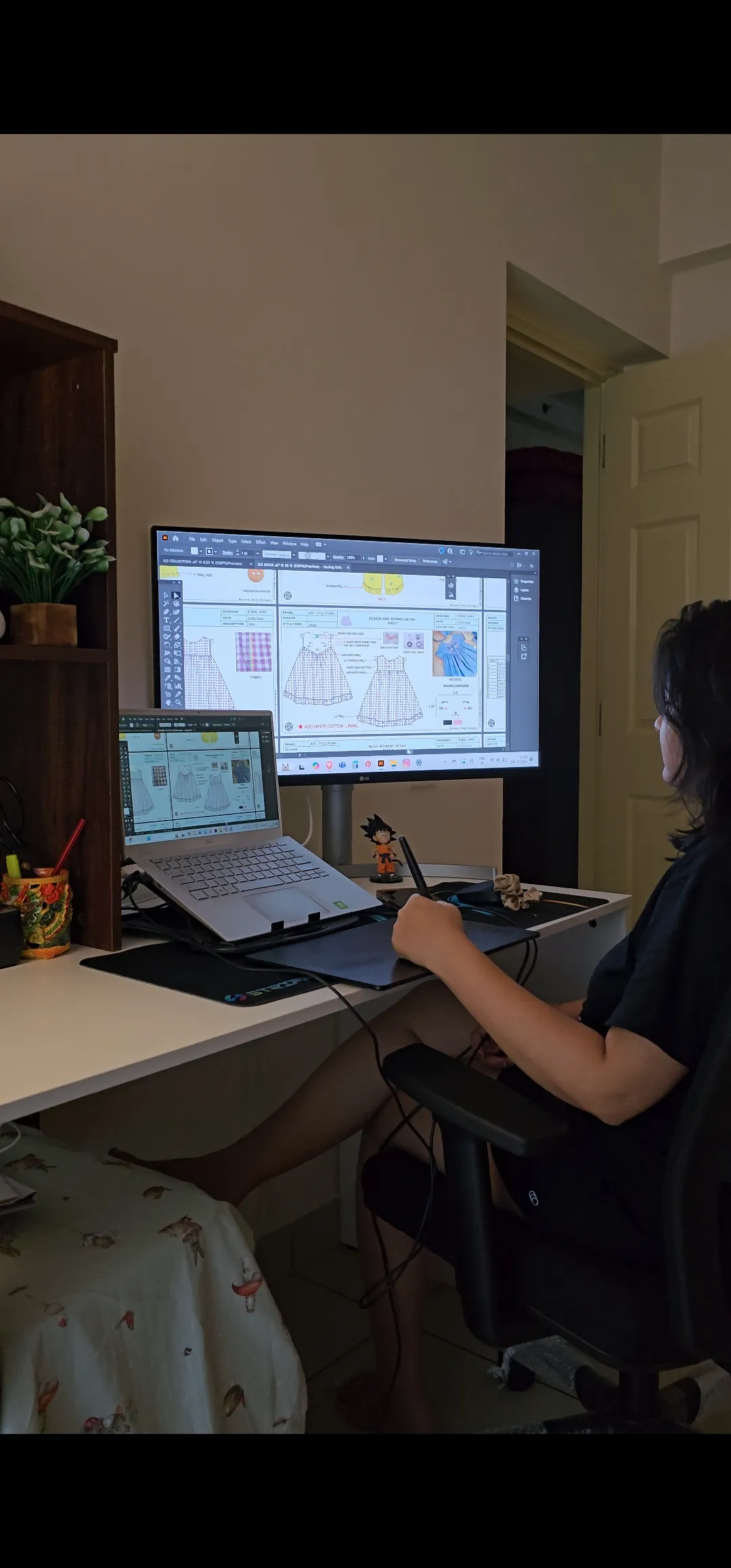 Komal Shah designing kidswear at her workstation in Bangalore